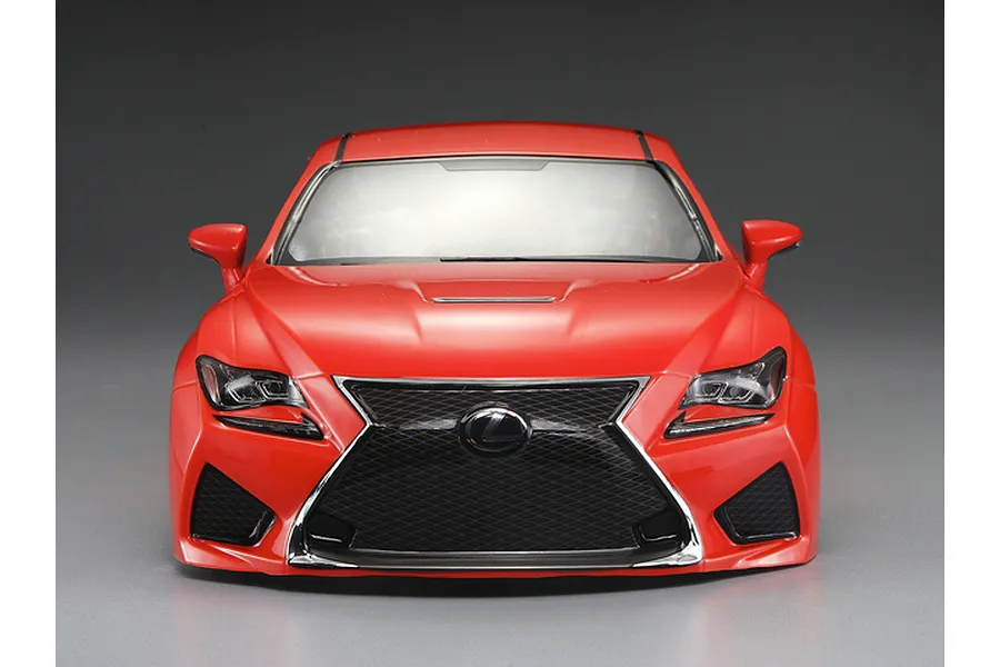 Front view of a 1/10 scale orange Lexus RC F RC car body shell by Killerbody, featuring a detailed spindle grille and headlights.