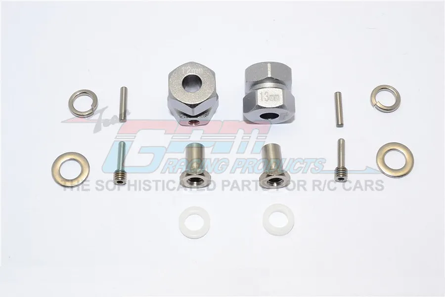 GPM Racing grey aluminium 12mm wheel hex adapters with 13mm extension, including pins, screws, and washers on a white background.