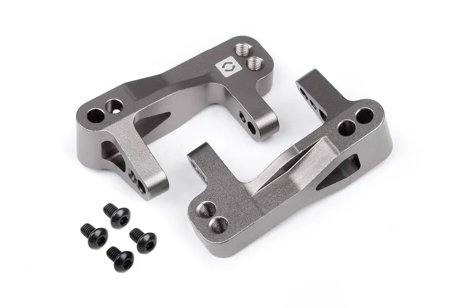 A pair of grey-silver aluminium C-hubs for an RC car, shown with four small black screws on a white background.