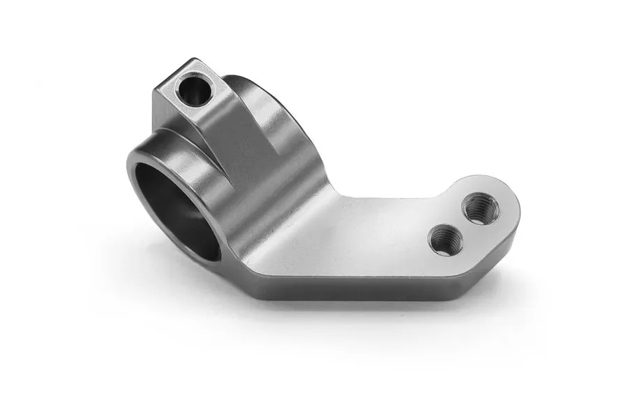 A single grey aluminium steering hub for an RC car, shown from a side angle against a white background.