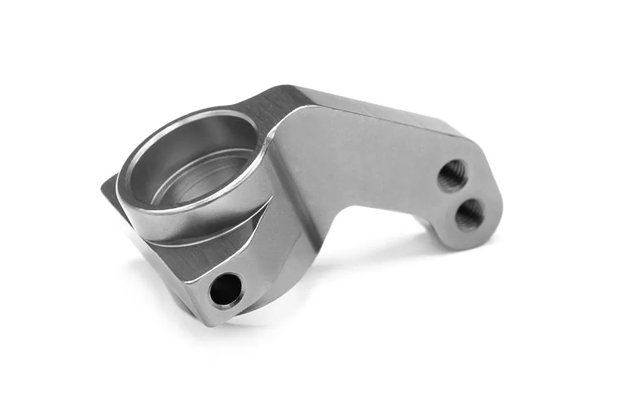 A single grey aluminium steering hub component for an RC car, shown from a side angle on a white background.