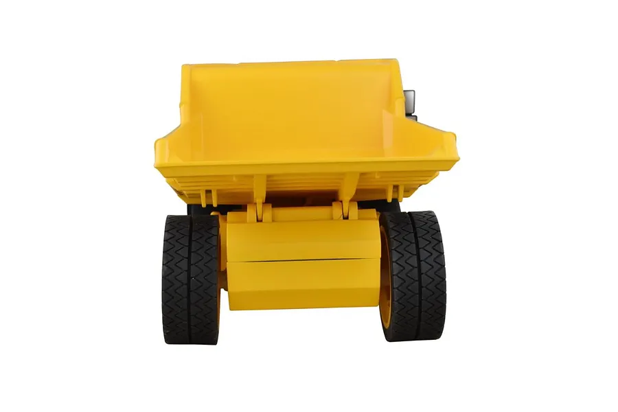 Rear view of a yellow Caterpillar RC mining dump truck model on a white background.