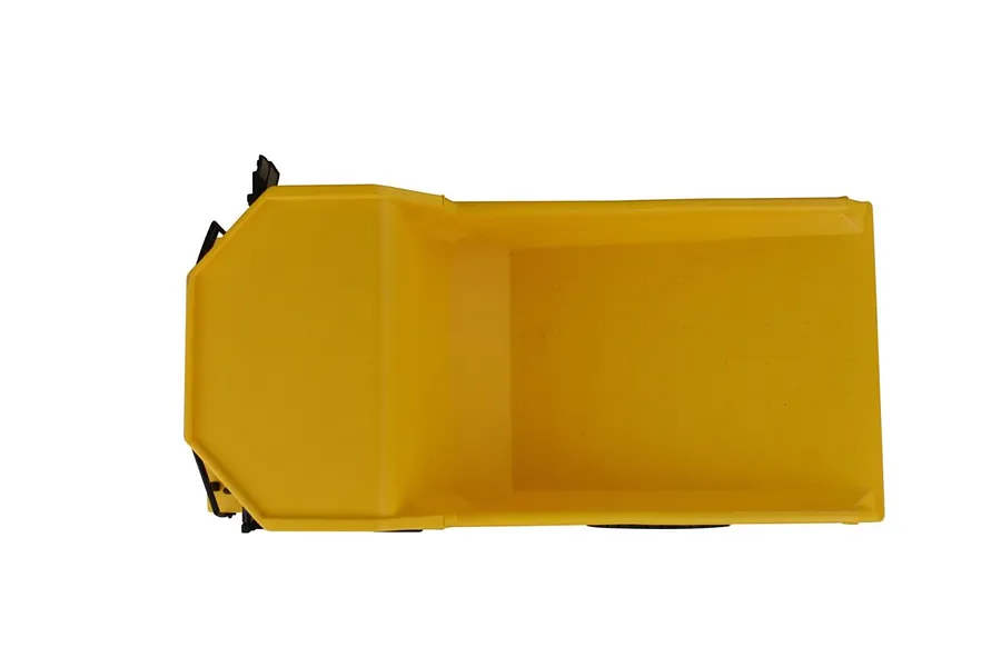 Top-down view of a yellow CAT 770 RC mining truck bed against a white background.