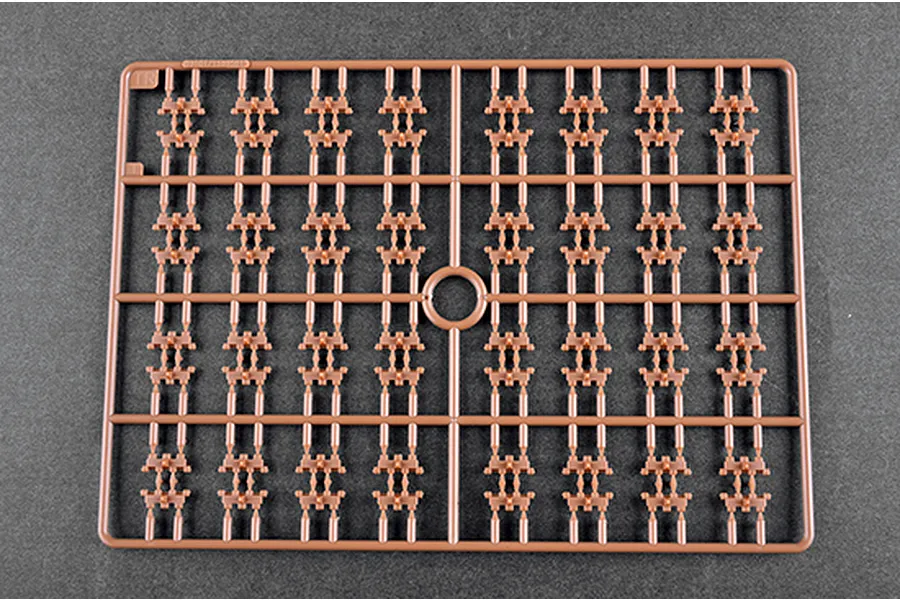 A brown plastic sprue containing numerous small, identical model parts for a Trumpeter 1/35 scale military model kit.