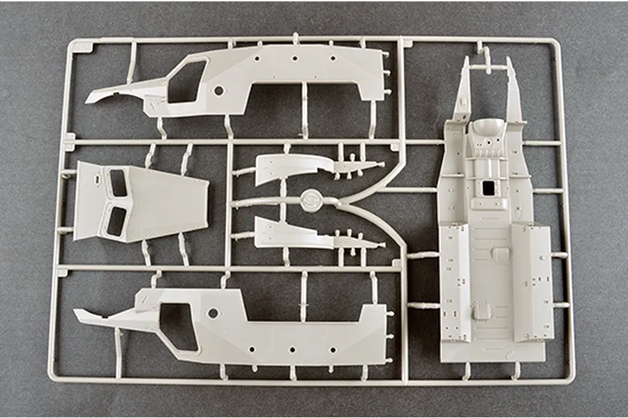 A grey plastic model kit sprue containing parts for a Soviet BTR-152K1 APC, including hull sides and floor panels.