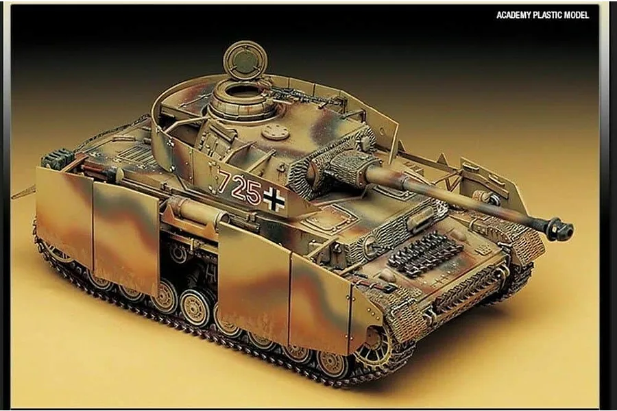 A high-angle studio shot of an assembled and painted 1/35 scale German Panzer IV H tank model with camouflage paint and side armor plates.
