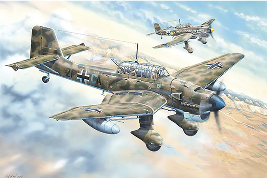 Box art illustration of two Junkers Ju-87 Stuka dive bombers flying over a landscape, featuring camouflage paint schemes and German military markings.