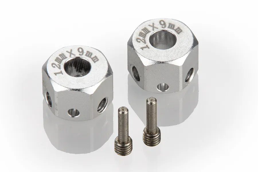 Two silver aluminium 12mm wheel hex adapters with 9mm extension, including two small threaded pins, on a white reflective surface.