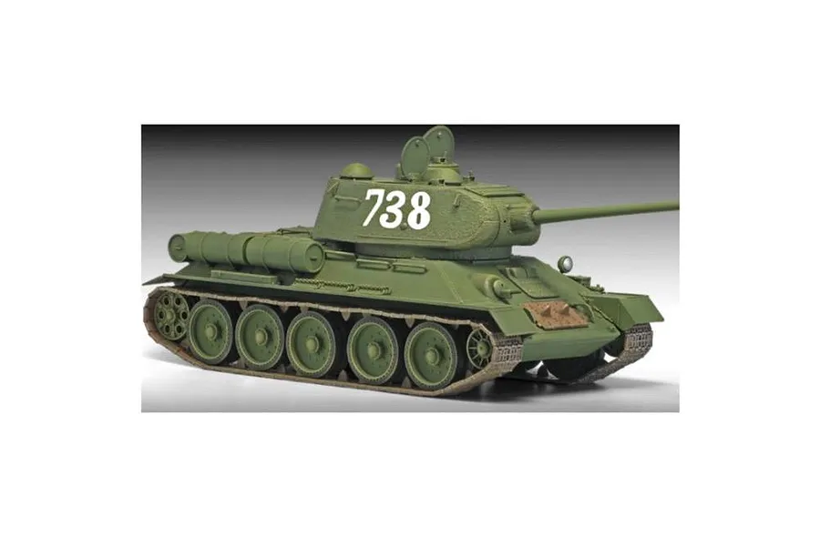 A studio shot of an assembled and painted 1/35 scale Academy T-34/85 tank model, featuring olive green paint and the number 738 on the turret.