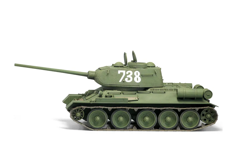 A side-profile view of a 1/35 scale Academy T-34/85 tank model, painted olive green with the number 738 on the turret.