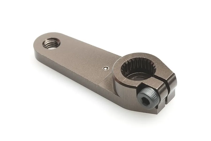 A single Kyosho long range steering servo horn for Futaba servos, featuring a gunmetal grey anodized aluminum finish and a clamping screw.