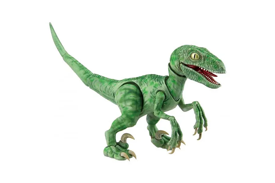 A green Velociraptor plastic model kit figure in a dynamic pose against a white background.