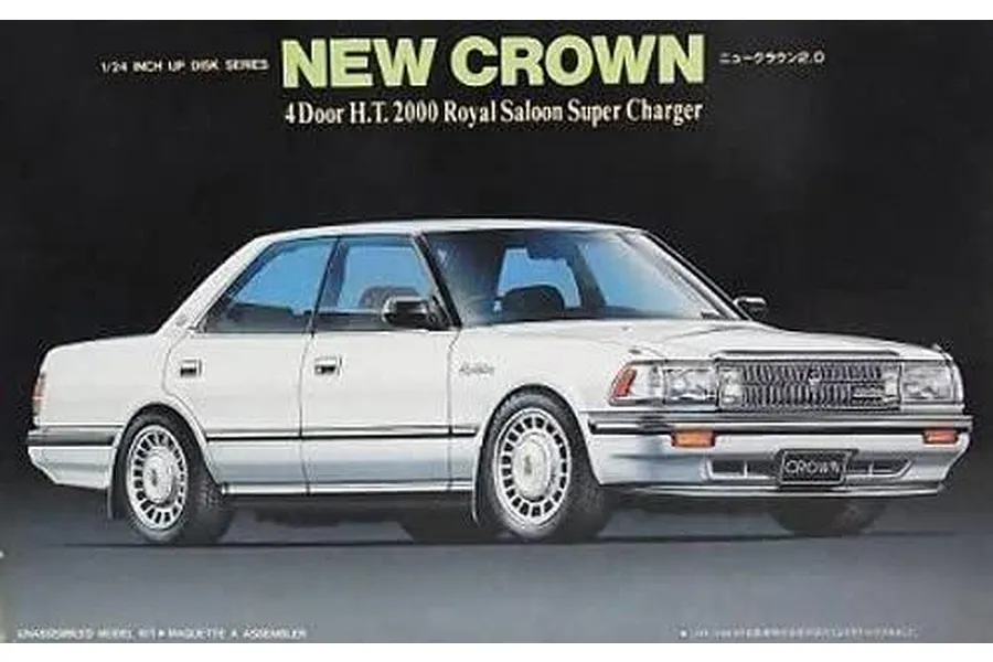 Fujimi 1/24 scale plastic model kit box art featuring a white Toyota Crown 130 2000 Royal Saloon Supercharger sedan.