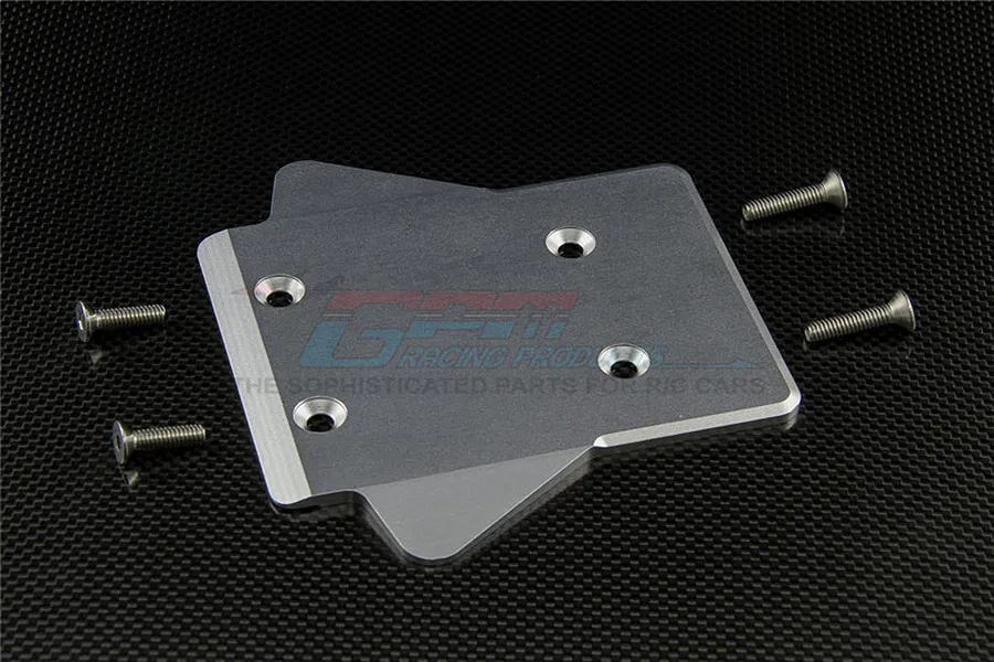 GPM Racing silver aluminium rear gear box skid plate with four mounting screws on a carbon fiber background.