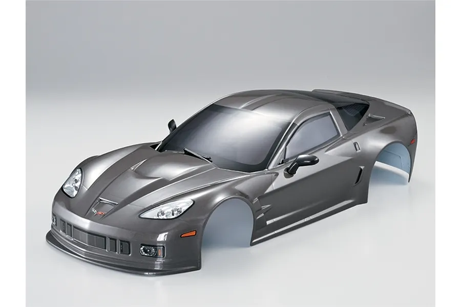 A silver-grey painted 1/10 scale RC car body shell modeled after a Corvette GT2, shown from a high-angle front three-quarter view.