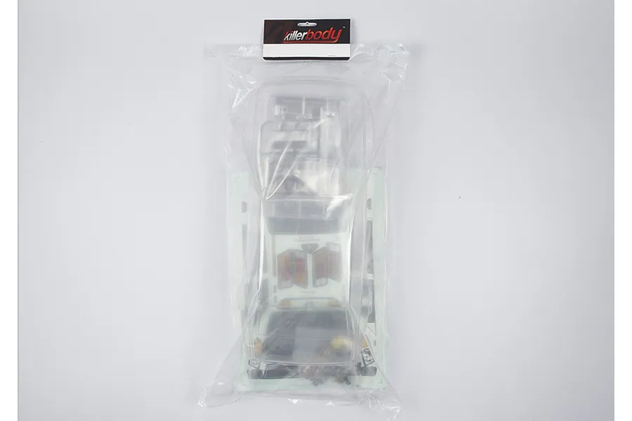 A clear, unpainted 1/10 scale RC car body shell in a plastic bag with a Killerbody header card.