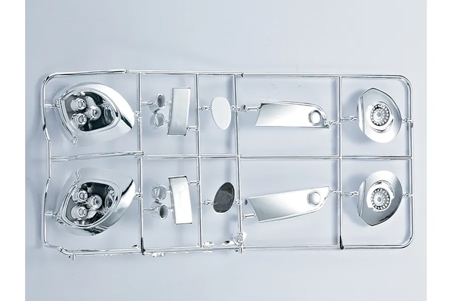 A chrome-plated plastic parts tree for a 1/7 scale Alfa Romeo 8C light bucket set, featuring various headlight and taillight housing components.