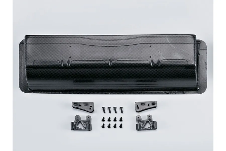 Killerbody 1/7 scale RC rear wing with a carbon fiber pattern, including mounting brackets and screws on a white background.