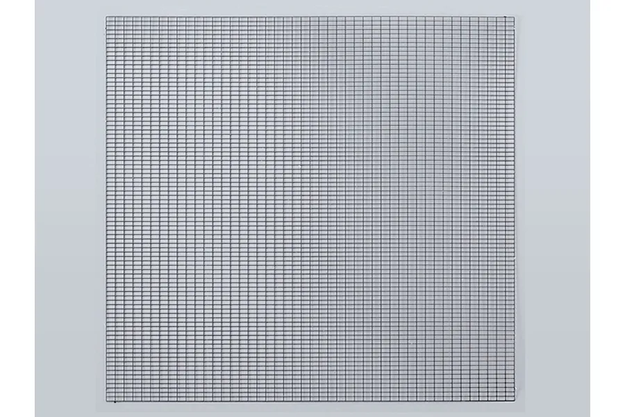 A square sheet of stainless steel mesh with a fine rectangular grid pattern, viewed from directly above against a plain light grey background.