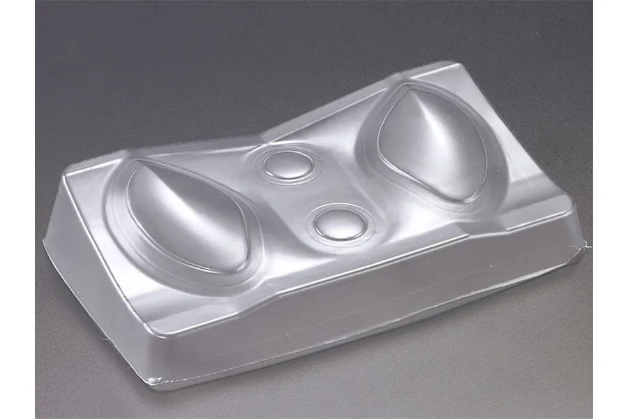 A clear, vacuum-formed plastic light bucket insert for a 1/7 scale RC Alfa Romeo 8C model.