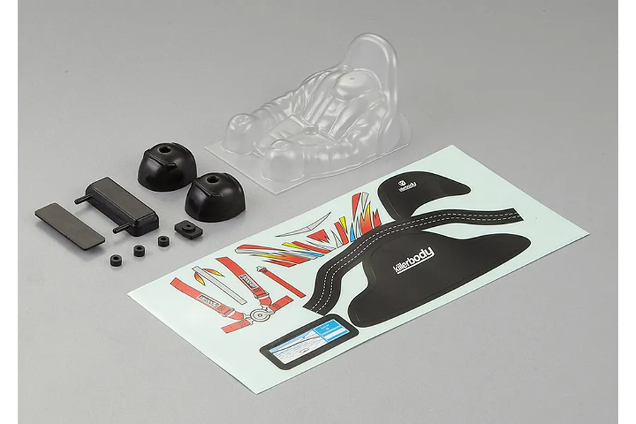 Killerbody 1/10 scale navigator set including a clear plastic seat, black plastic interior components, and a decal sheet on a grey background.