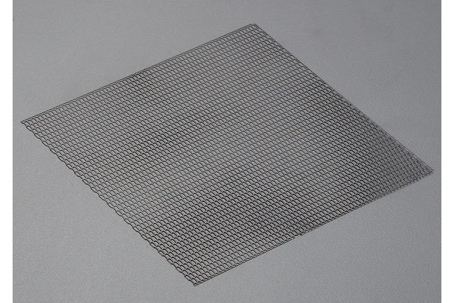 A square sheet of black stainless steel mesh for RC car air intake modification.