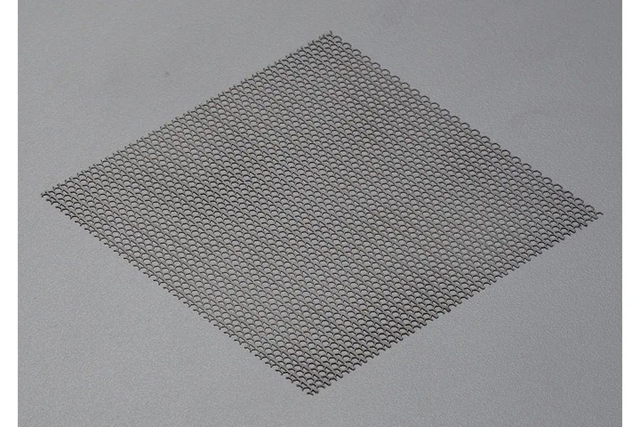 A square piece of black stainless steel mesh for RC car air intakes.