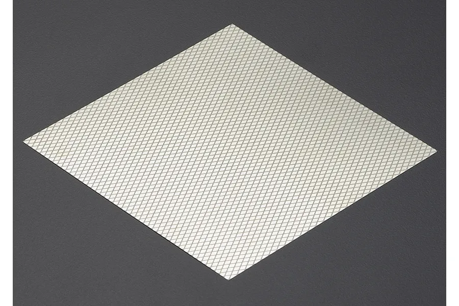 A square sheet of silver-coloured stainless steel mesh with a diamond pattern, set against a dark grey background.