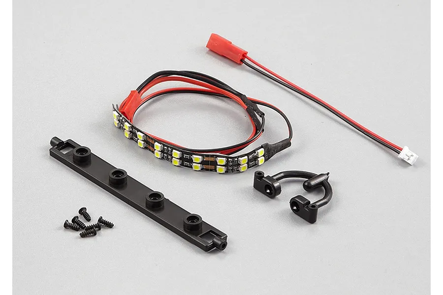 Killerbody accent light set including an LED strip, mounting brackets, and small screws on a light grey background.