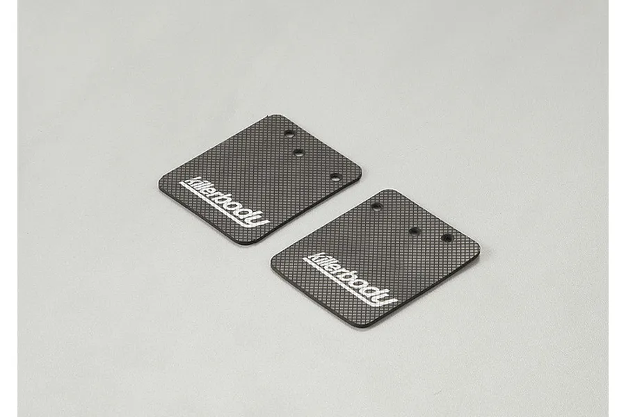 Two black rubber mud flaps for RC crawlers with a textured surface and white Killerbody logo, displayed on a light grey background.