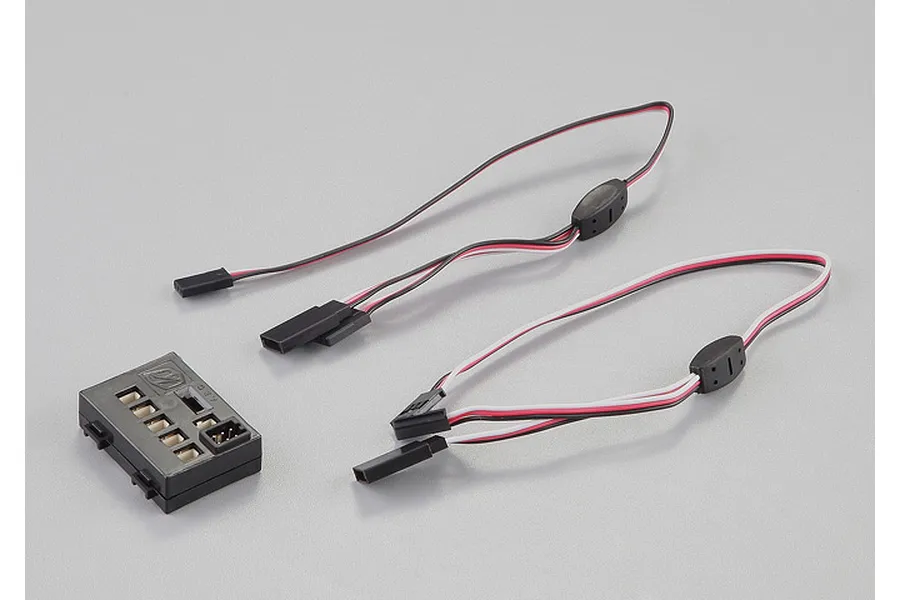 Killerbody LED light control box with two connecting wire harnesses on a plain grey background.