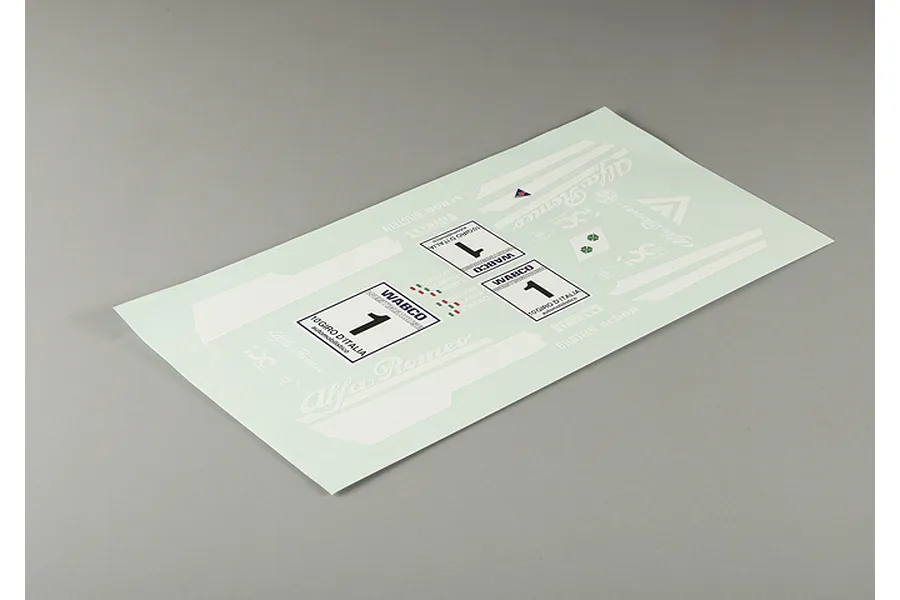 A Killerbody 1/10 scale decal sheet for an Alfa Romeo 75 Turbo Evoluzione, featuring racing numbers and sponsor logos on a light backing sheet.