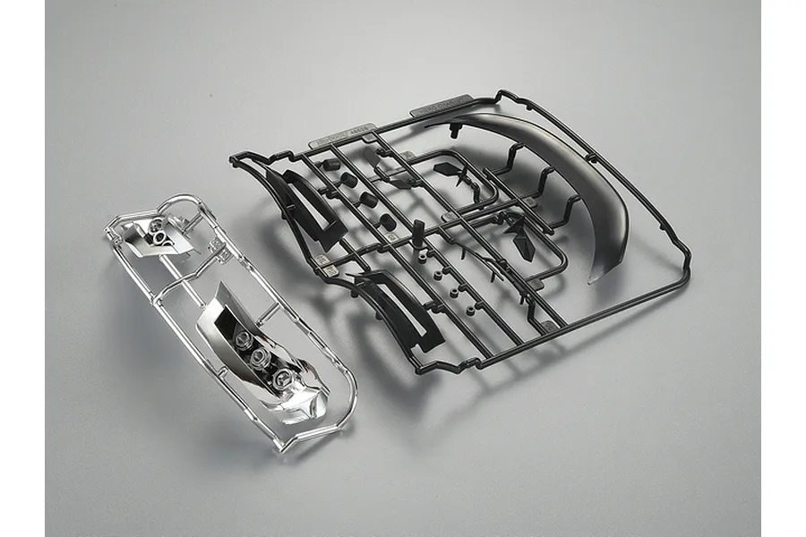 Killerbody 1/10 Hero Chariot plastic parts set on two sprues, one black and one chrome-plated, against a plain grey background.