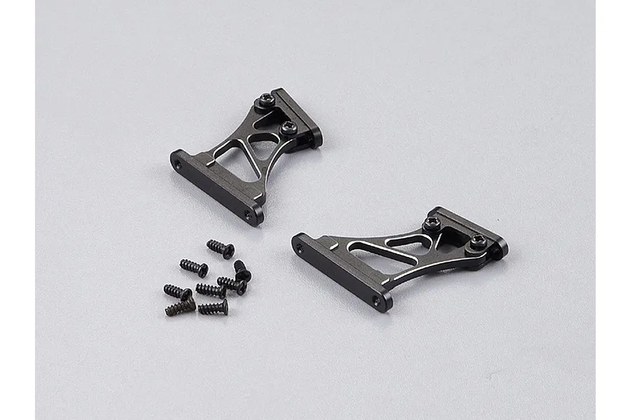 Two black aluminium RC rear wing mounts with a set of small black screws on a plain grey background.
