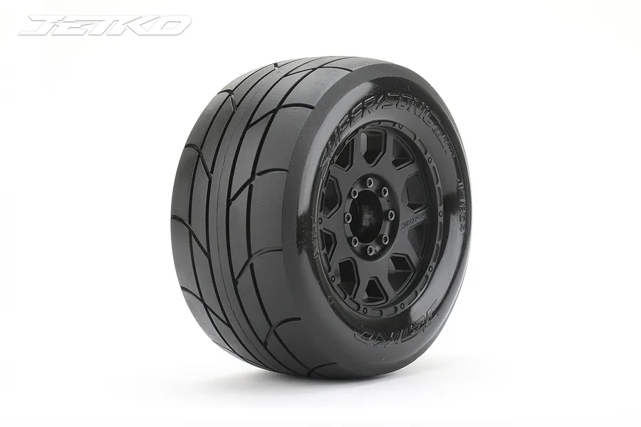 A single Jetko 1/8 scale MT Ex-Super Sonic tyre mounted on a black multi-spoke Claw rim against a white background.