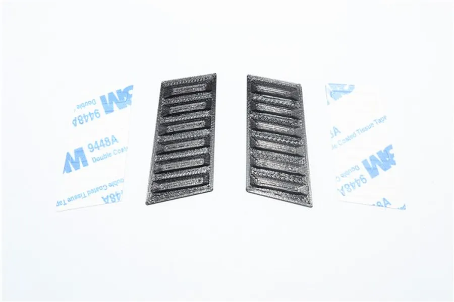 Two black GPM Racing front air intake covers with 3M adhesive backing strips displayed on a white background.