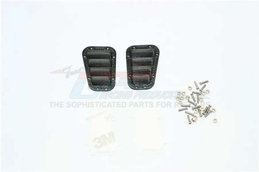 Two black plastic fender vents for RC cars, accompanied by a set of small metal screws, nuts, and two 3M adhesive pads on a white background.