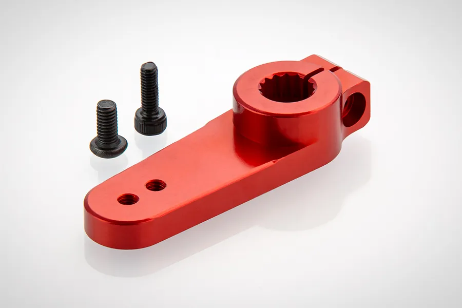A red anodized aluminium servo horn with two black metal screws on a white background.
