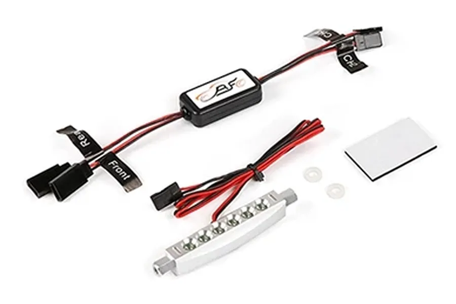 Rovan RC light controller kit including a control module, a silver LED light bar, wiring, and mounting hardware on a white background.