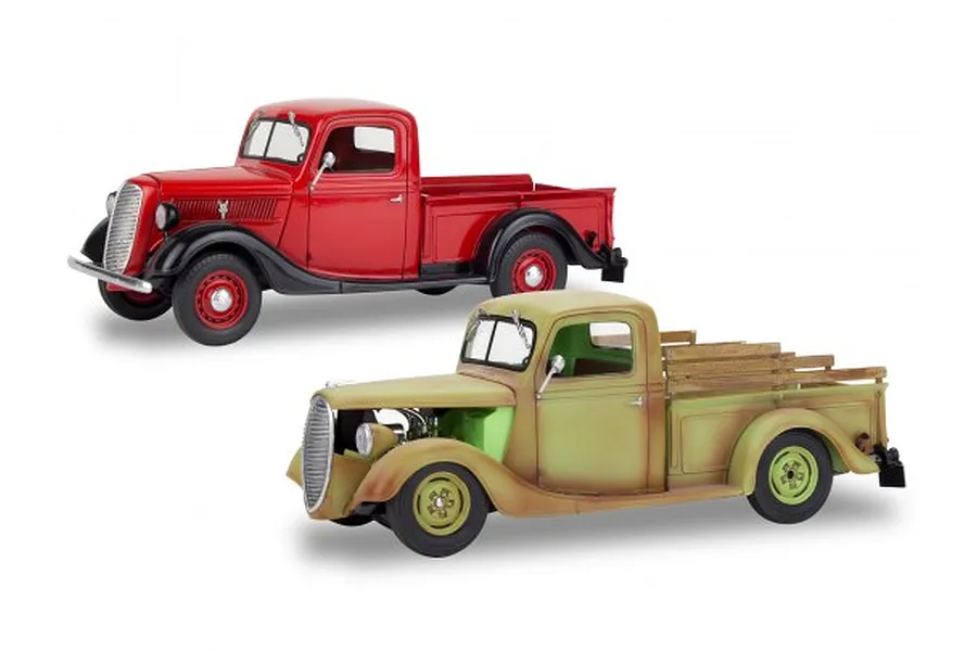 Two 1/25 scale model 1937 Ford pickup trucks, one painted glossy red and the other a weathered, distressed green finish.