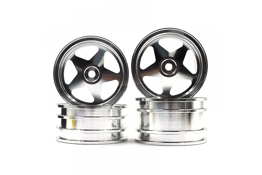 A set of four silver 5-spoke aluminium RC car rims stacked against a white background.