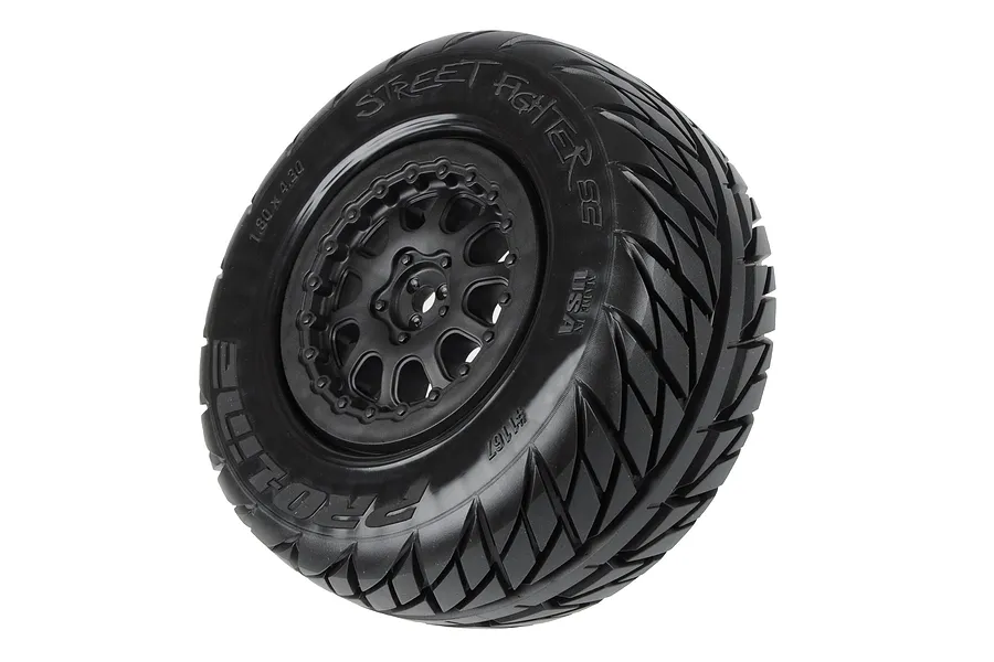 A single Pro-Line Street Fighter SC tyre mounted on a black beadlock-style wheel against a white background.