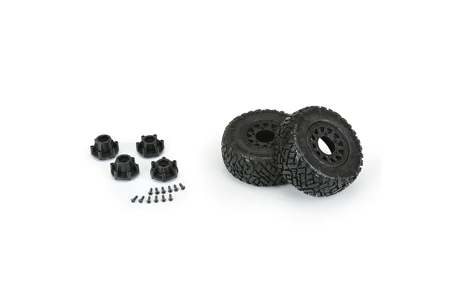 Two Pro-Line 2.2/3.0 inch Icon M2 short course tires pre-mounted on black Raid rims, with four wheel hex adapters and mounting screws included.