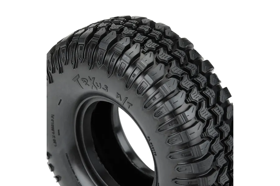 Close-up of a Pro-Line 1.9 inch Interco TrXus M/T G8 RC rock crawler tyre showing the aggressive tread pattern and sidewall branding.