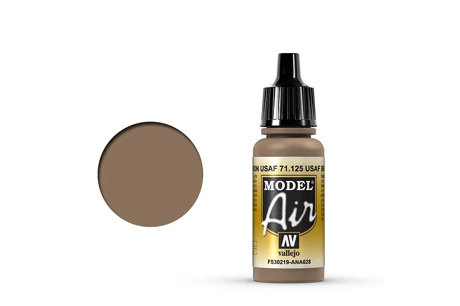 A 17ml bottle of Vallejo Model Air USAF Brown acrylic paint with a black dropper cap, shown next to a brown paint swatch.