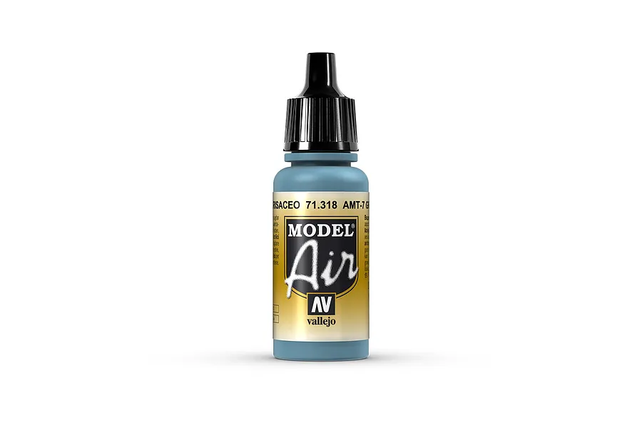 A 17ml bottle of Vallejo Model Air AMT-7 Greyish Blue acrylic paint with a black dropper cap, centered against a white background.