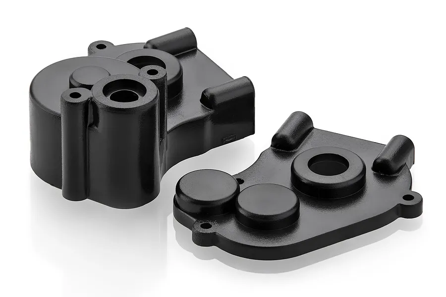 Two black plastic HSP gearbox case halves shown from a high angle against a white background.
