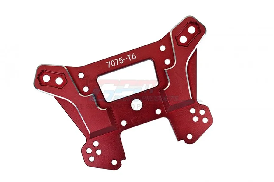 A red anodized aluminium front shock tower for an RC car, featuring multiple mounting holes and 7075-T6 branding.