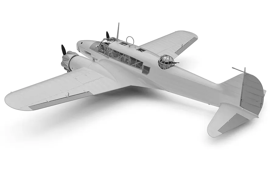 A grey, unpainted plastic model of an Avro Anson Mk.I aircraft, viewed from a high rear three-quarter angle against a white background.