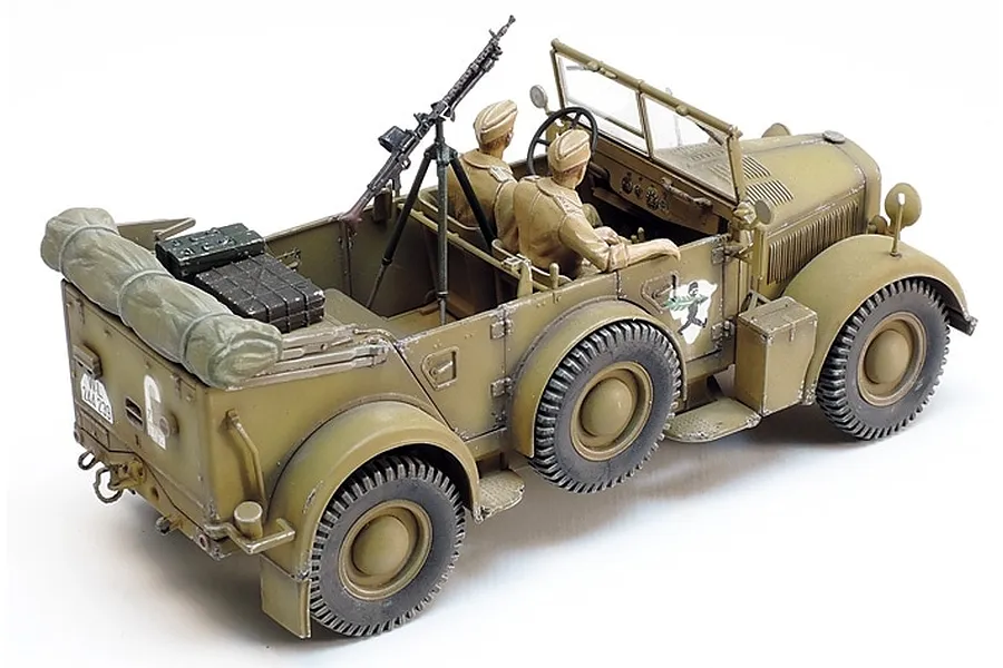 A 1/35 scale model of a German Horch KFZ.15 military vehicle painted in desert tan, featuring two soldier figures and a mounted machine gun.